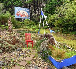 Photo Red Chair at Port Orford sign