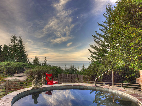 Photo Red Chair next to WildSpring spa overlooking ocean