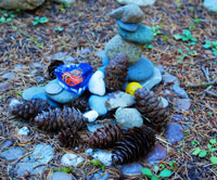 Photo of center of walking labyrinth with altar of small stones