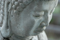 Photo closeup of stone Buddha face