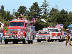 Photo of fire trucks in Fourth of July parade