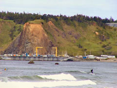 Photo Port of Port Orford dock from the ocean toward the land