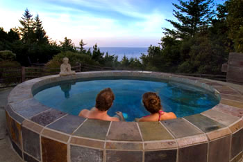 Photo of couple in spa overlooking ocean